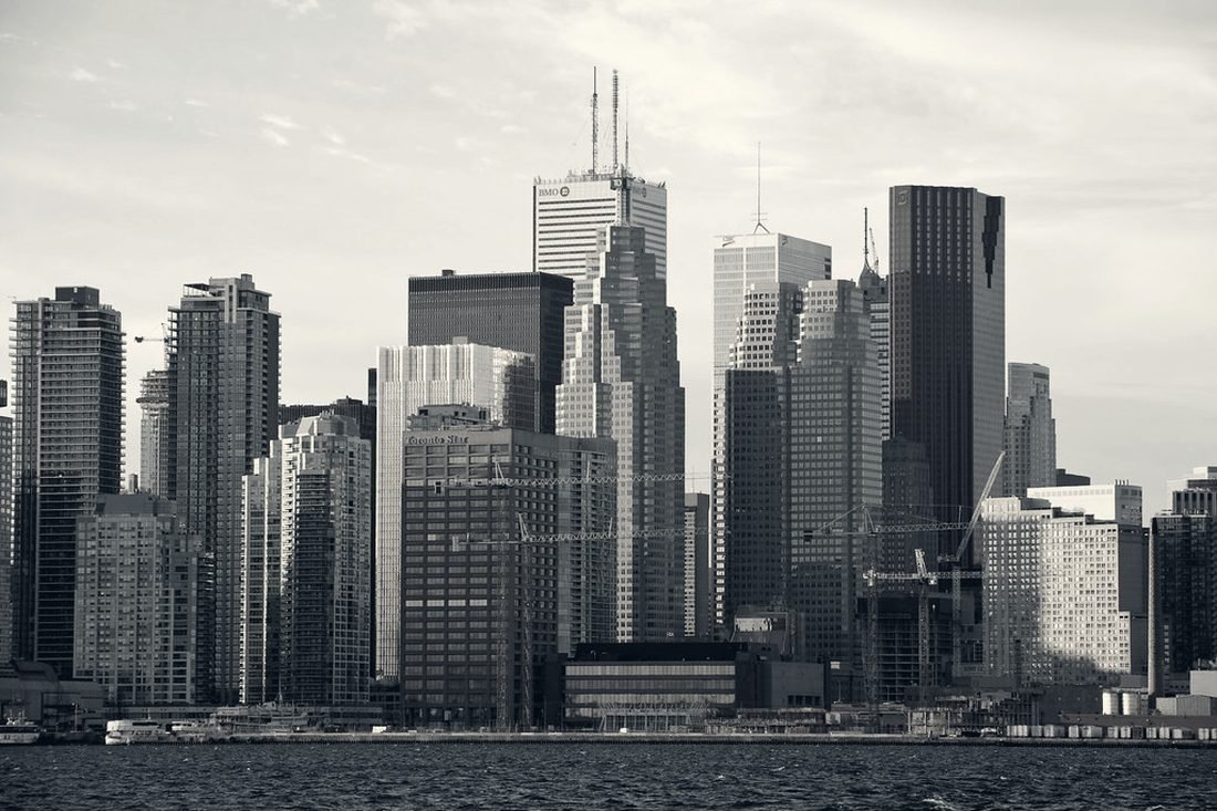 Toronto's downtown skyline photographed from the harbour on a clear day